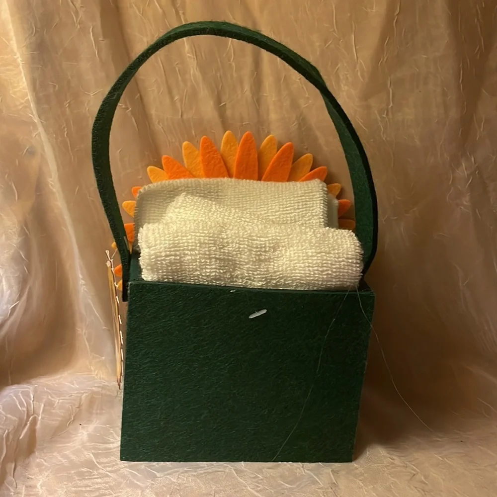 NWT- 3 pack washcloths 100% cotton in felt basket w/sunflower on front
